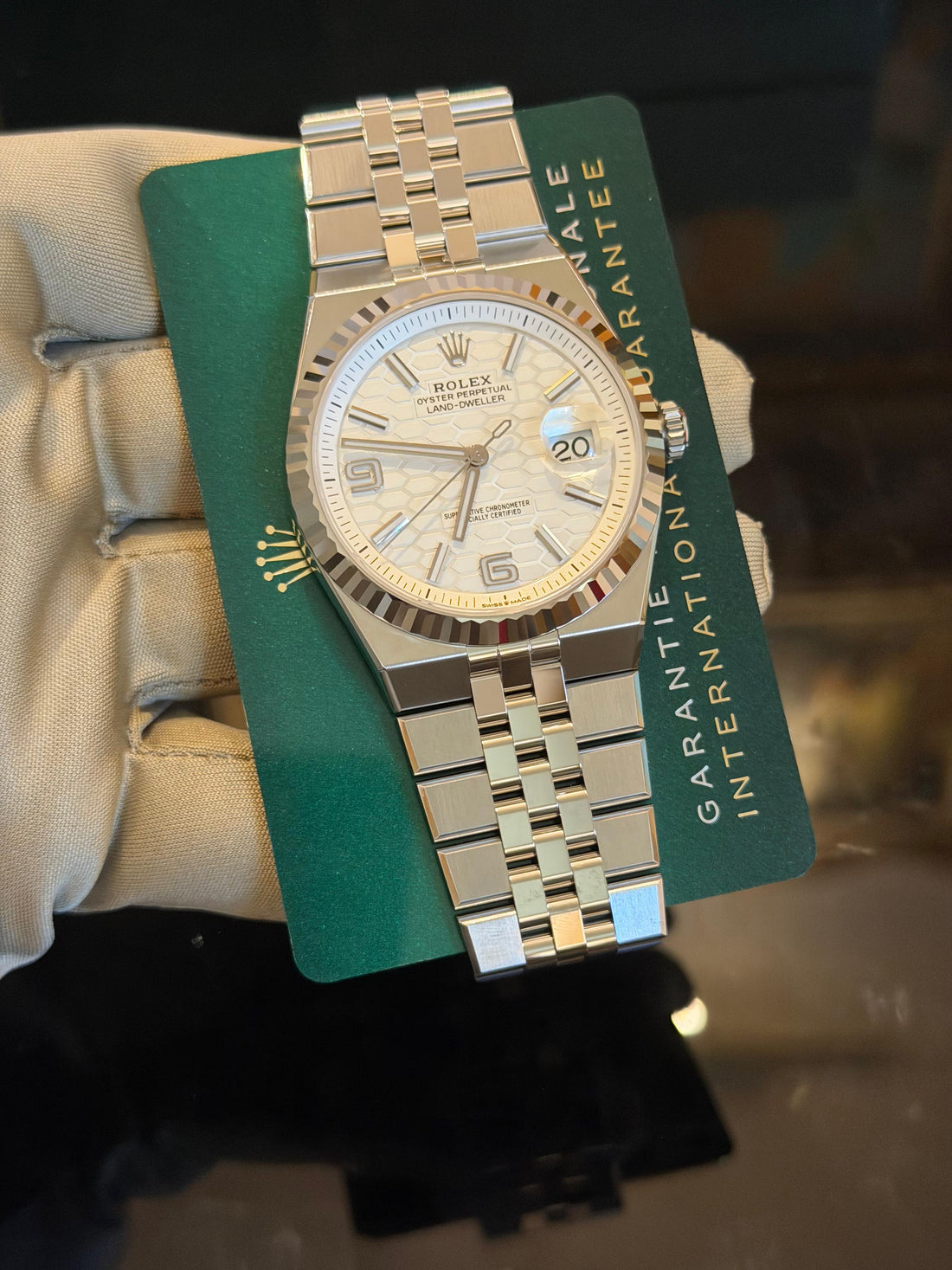 Rolex Land-Dweller 40 White Gold Oystersteel Intense White Honeycomb Motif Dial Fluted Bezel Flat Jubilee Bracelet 127334 - 2025